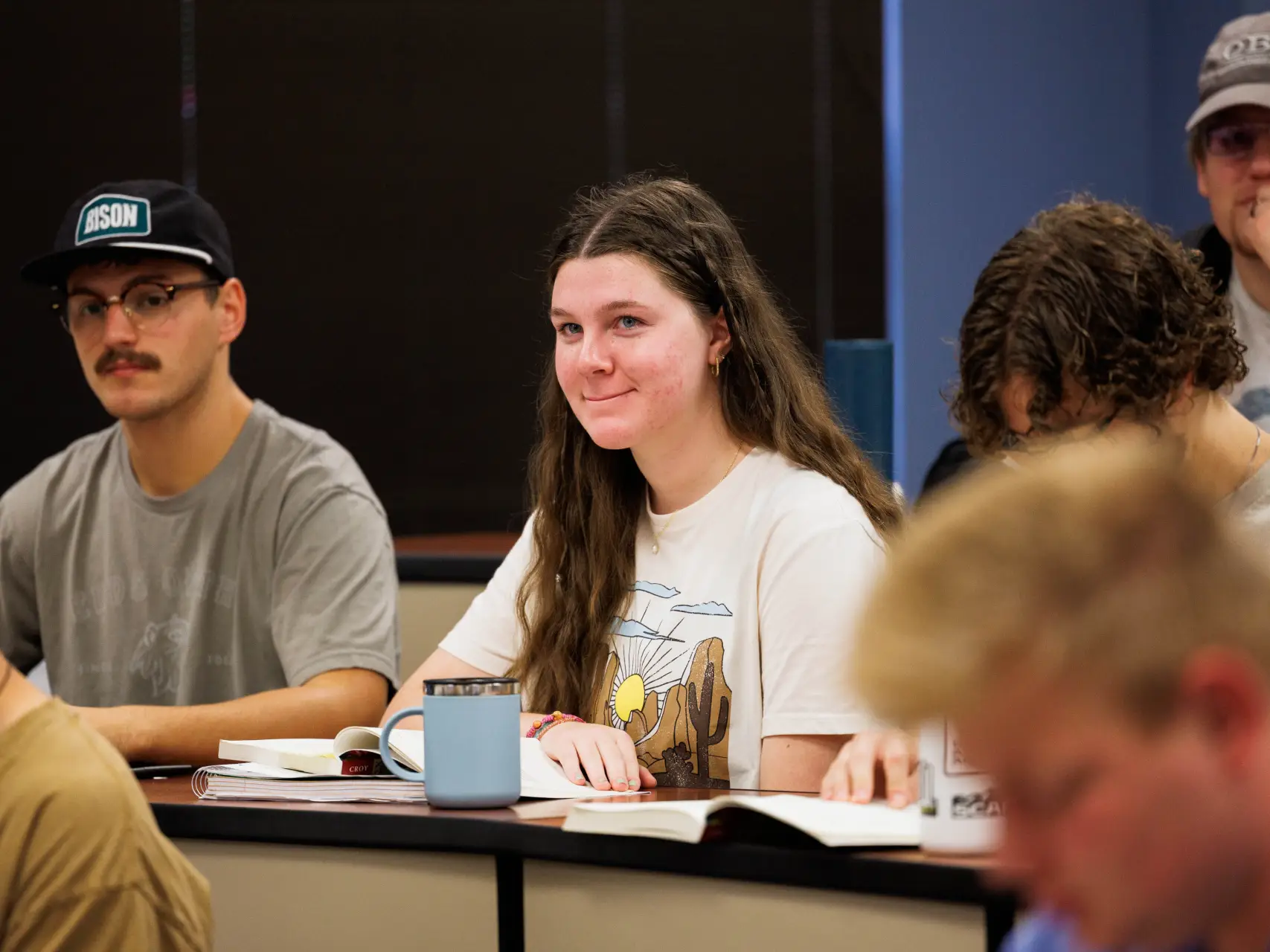 Students siting in class listening to OBU class lecture.