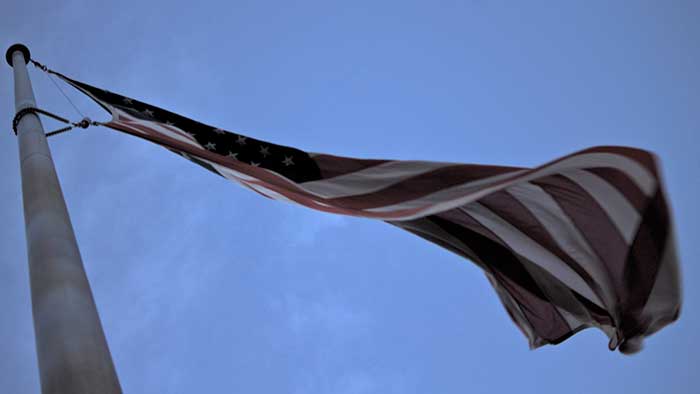 An American flag centered in OBU's circle drive on campus.