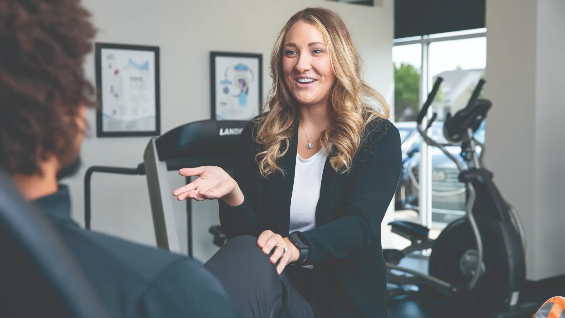 Physical Therapy professor talking to student.