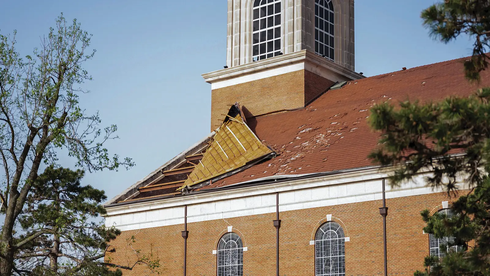A section of Raley Chapel's roof is peeled back