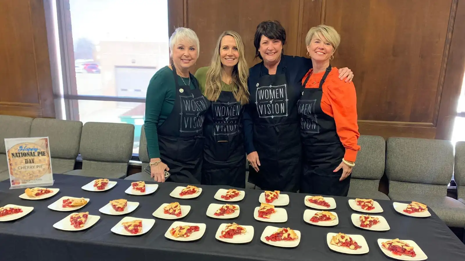 women of vision serving pies
